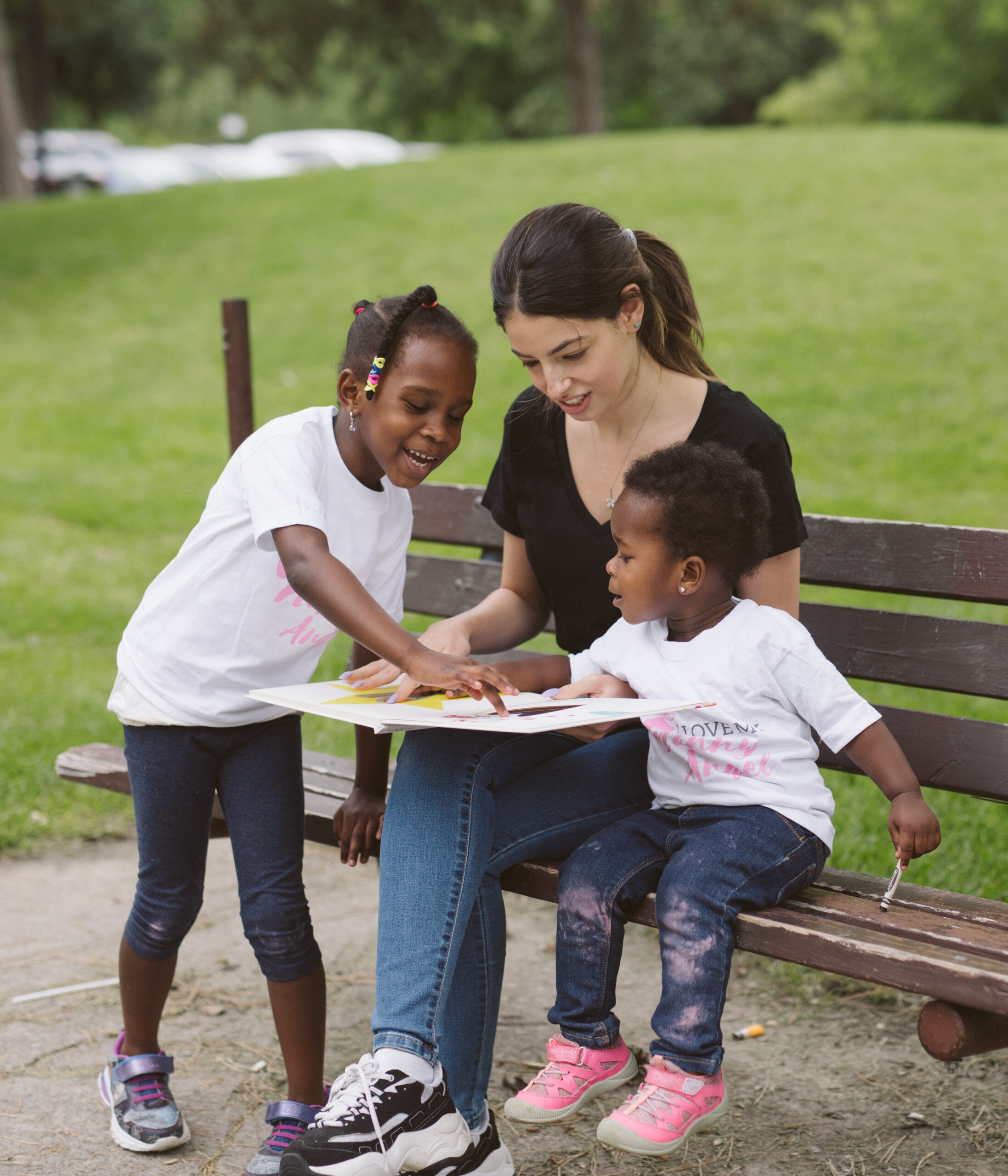 Nankind volunteer with Nankind children during graduation celebration.