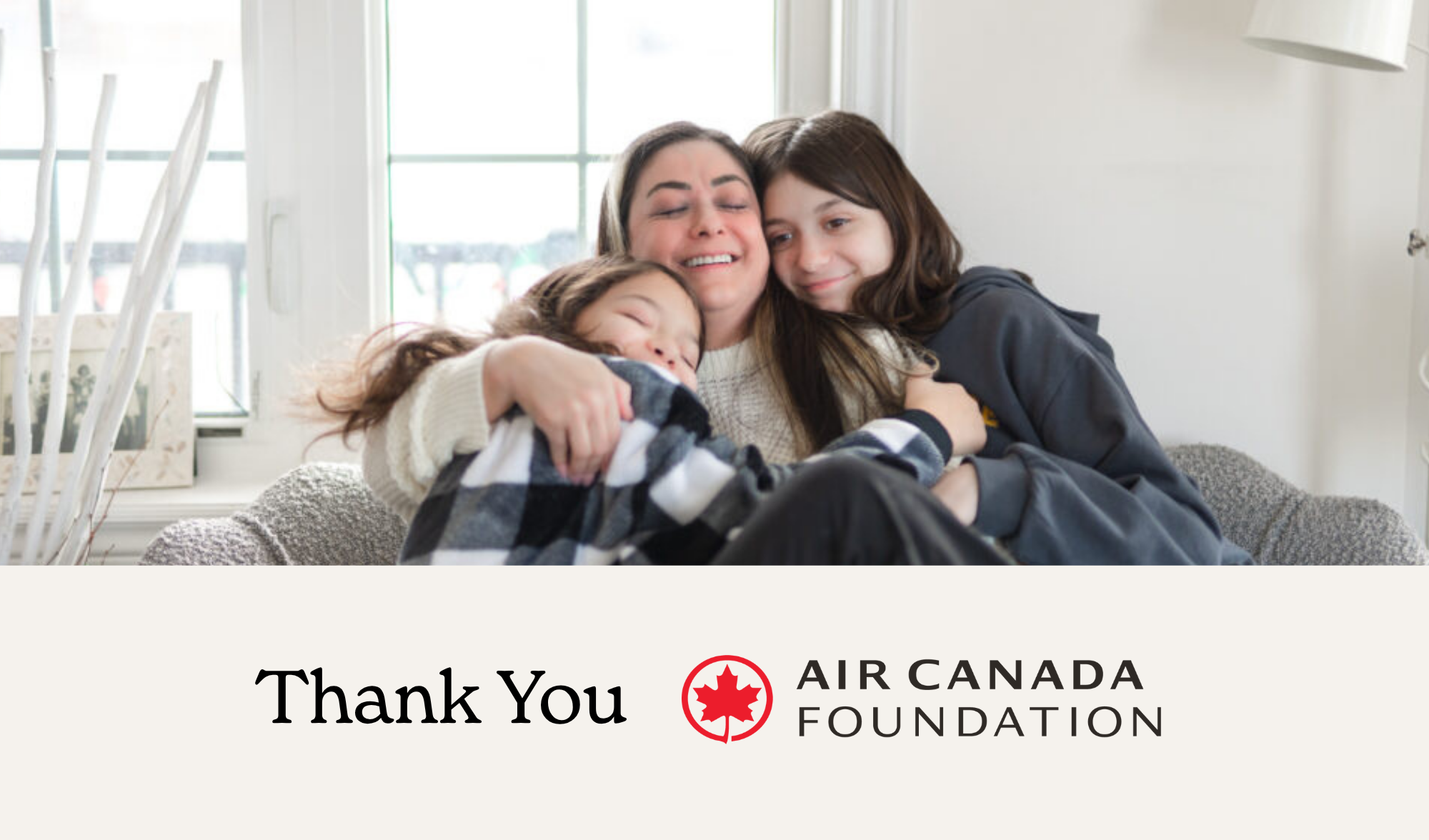 Nankind family hugging